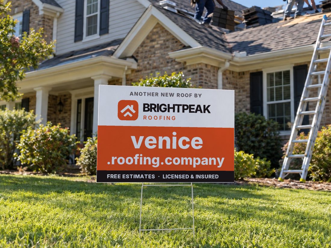 venice.roofing.company on a yard sign in front of a house getting a new roof
